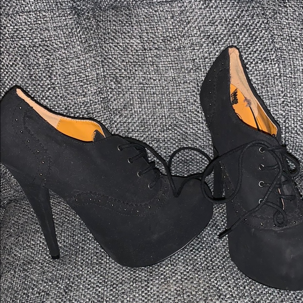 Black bejeweled platform laced closed toe booties